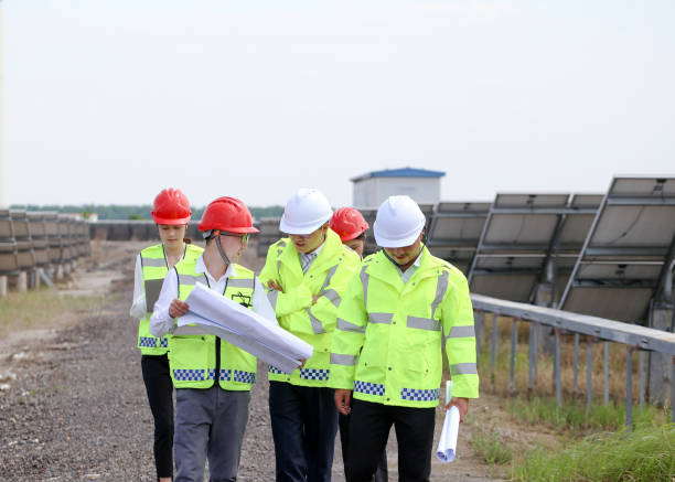 istock Engineers and technicians patrol the new energy base 977674354