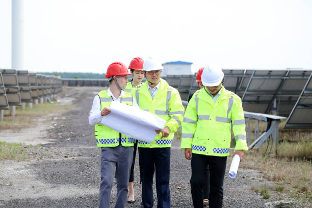 istock Engineers and technicians patrol the new energy base 977674366