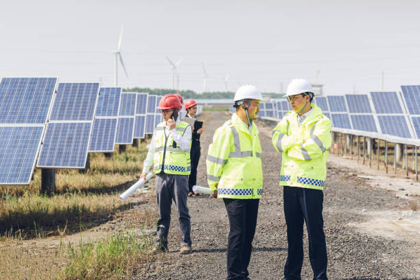 istock Large photovoltaic power stations and engineers in China 977674660