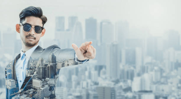 istock Double exposure businessman pointing at copy space 977691384