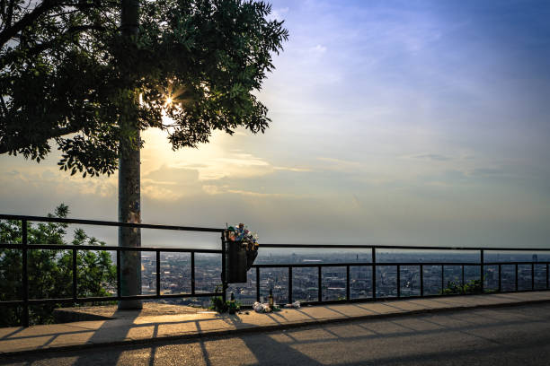 istock Panoramic view of Budapest with a full trashcan and lots of garbage 977702030