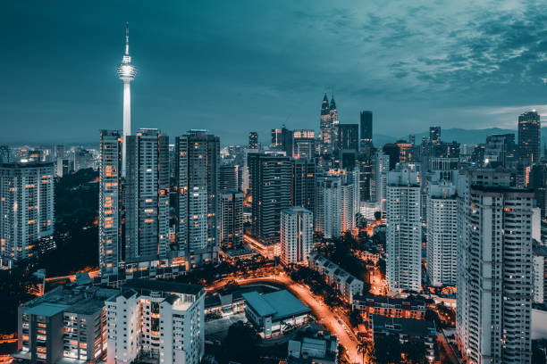 kuala lumpur in dusk hour twin tower and kl tower from top view