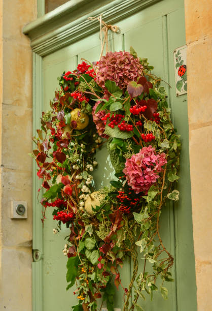 istock Wreath on a wooden door 977712080