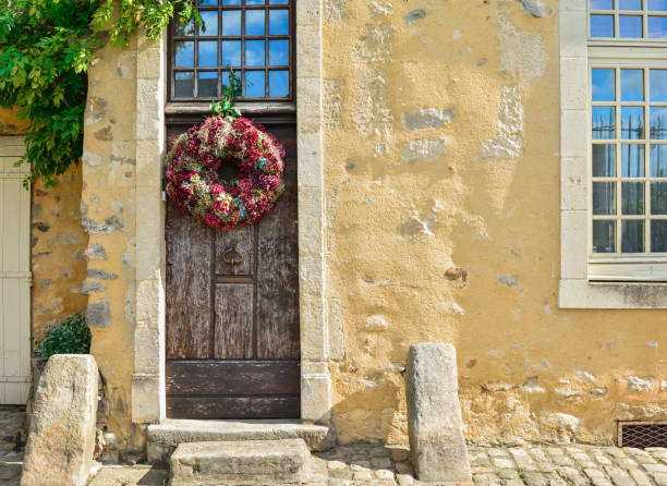 istock Hydrangea wreath on a wooden door 977712082