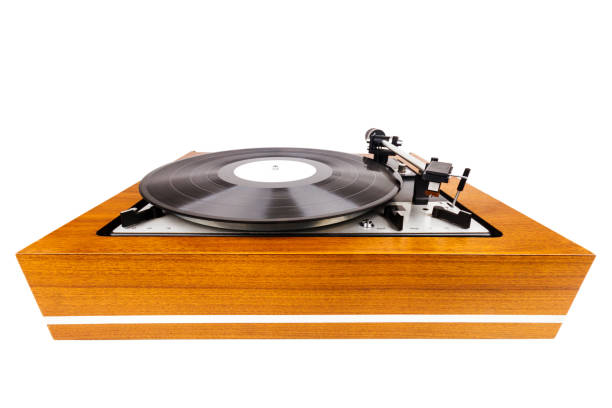 istock Vintage turntable vinyl record player isolated on white 977712642