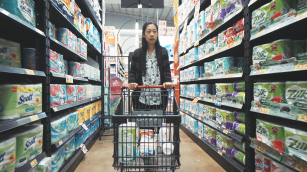 istock Woman finding product inside supermarket 977720982
