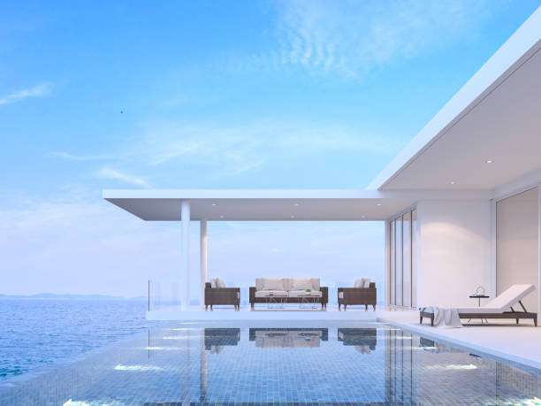 istock Pool villa living room with sea view 3d render 977753602