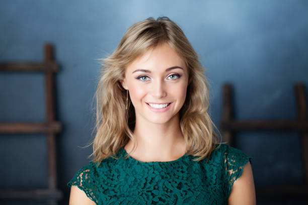 istock Beautiful female model smiling. Young woman face 977758058
