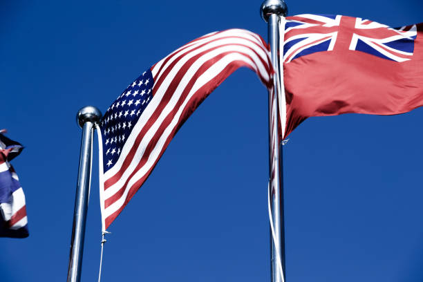 istock American Flag Blowing in the Wind 977758312