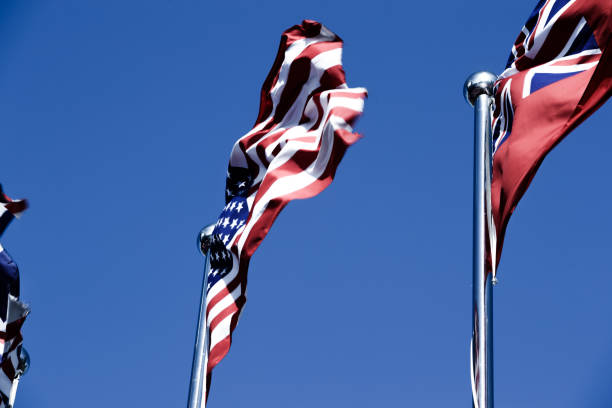 istock American Flag Blowing in the Wind 977758318