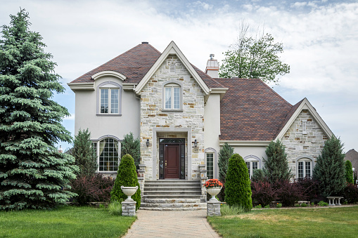 Luxurious property located in Le Fontainebleau, Blainville neighbourhood, a rich suburb of Montreal on a sunny day of summer.