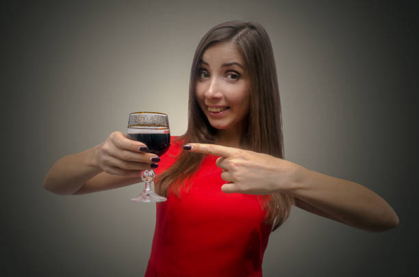 istock Woman in red dress. 977805940