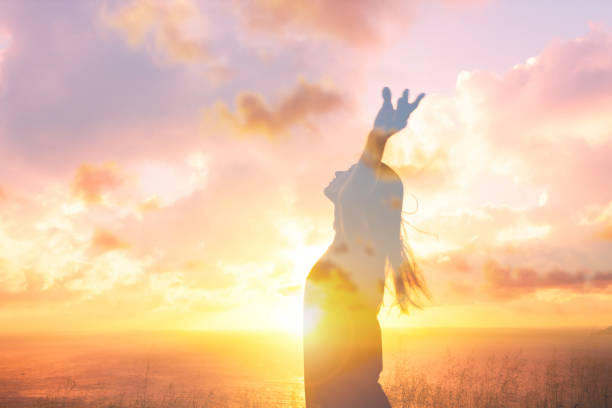Happiness and freedom Young at sunset woman with arms in the air. Double exposure. sunrise timelapse stock pictures, royalty-free photos & images