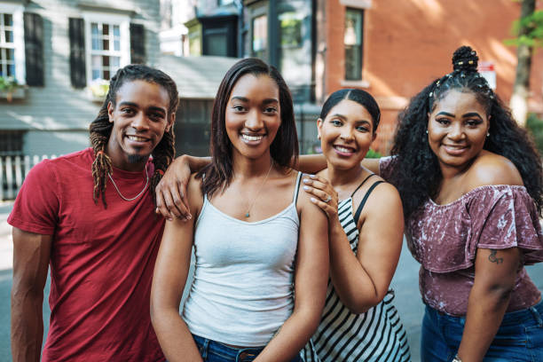 istock Group of multi ethnic group of students in NYC 977824114