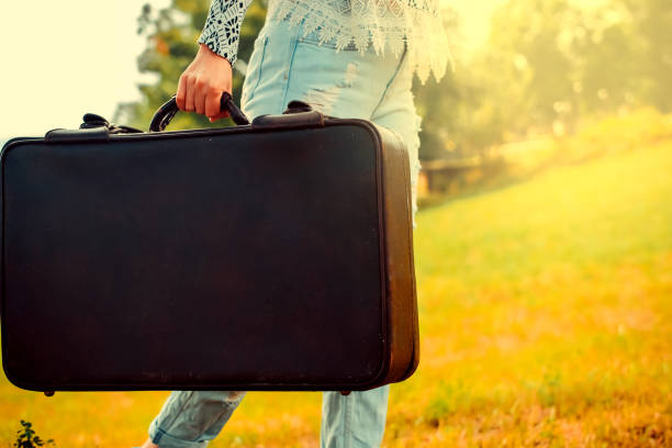 istock woman going far away 977859550
