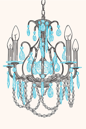 A hanging crystal chandelier with a string of beads hanging from the arms.