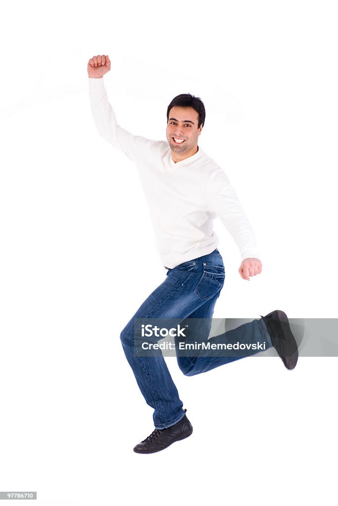 Glücklicher Mann springen - Lizenzfrei Freisteller – Neutraler Hintergrund Stock-Foto