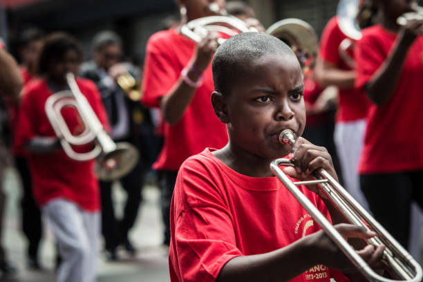 Voronezh, Russia - May 31, 2015: Marching band of youth pupils on the Music Festival of Children's Brass Bands on the city central square.