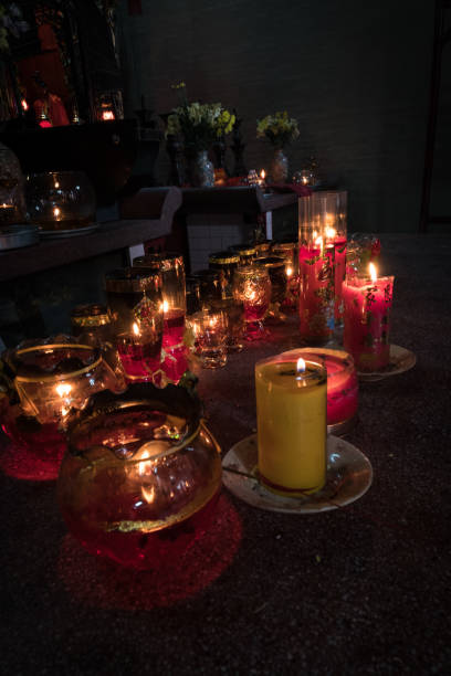 istock Prayer candles in temple 977934400