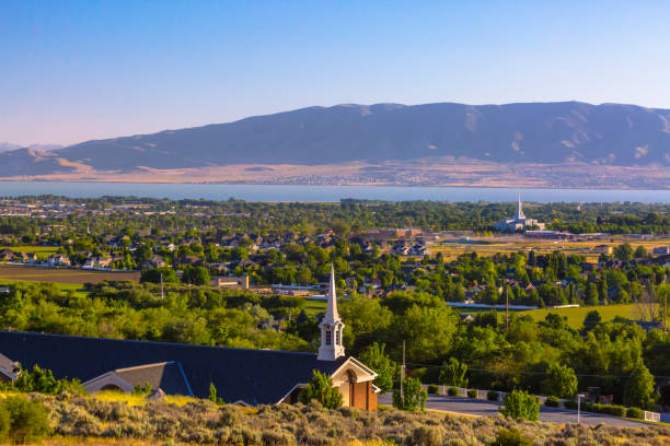 istock Mormon Church with temple and Utah Lake 977945142