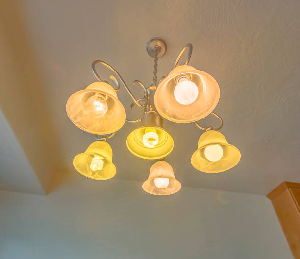 istock Small chandelier in model home 977983606