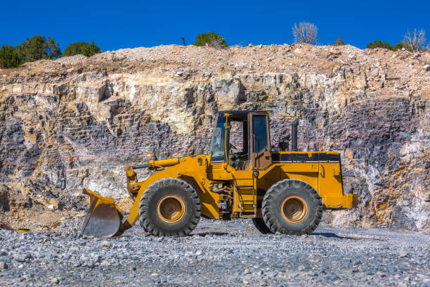 istock Tractor leveling the ground for new homes in Utah 977988474