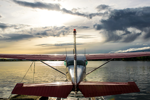 Float plane  at the bank of Tuaton Lake in Spatsizi Plateau Wilderness Provincial Park, Canada