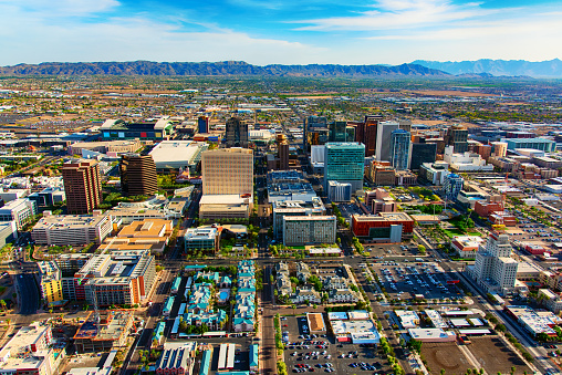 An aerial view of downtown Phoenix, Arizona and the surrounding urban area from an altitude of about 1500 feet during a helicopter photo flight.
