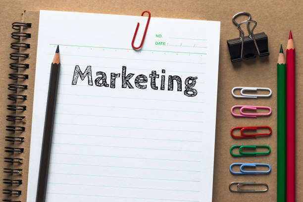 istock Text Marketing on white paper background / business concept 978096898