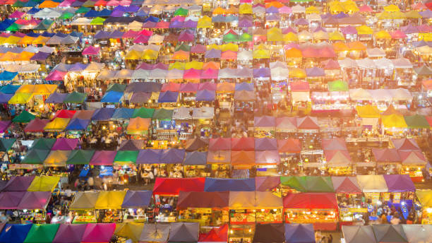 istock Night flea market multiple colour roof top 978105328
