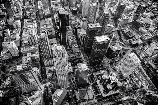 The downtown buildings of the city of Los Angeles, California in black and white shot from an altitude of about 2000 feet directly overhead.