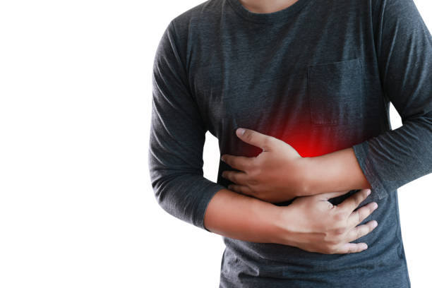 istock MAN with symptomatic acid reflux , suffering from acid reflux 978133792