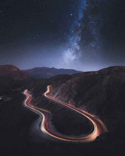 Grimes Canyon Long Exposure with car trails and milkyway Grimes Canyon near Los Angeles night photography winding road mountain stock pictures, royalty-free photos & images