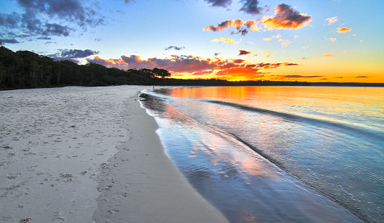 Sunset over the beach next to the Green Patch Campground in Jervis Bay National Park, New South Wales, Australia.