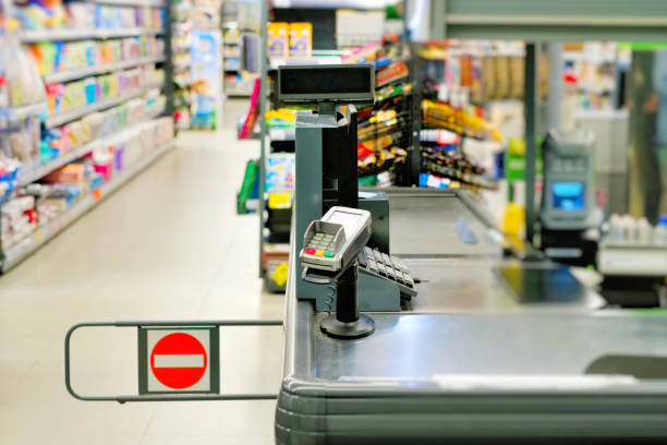 cashier counter in the supermarket. - department store shopping mall store inside of imagens e fotografias de stock