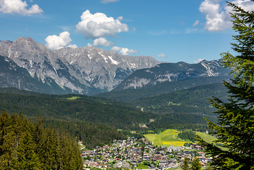 An elevated view looking down on the town of Seefeld in the Austrian Alps.