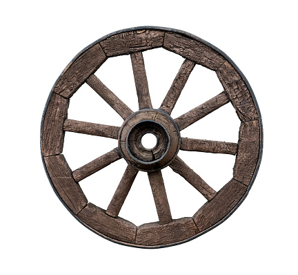 Old wooden wagon wheel isolated on white background
