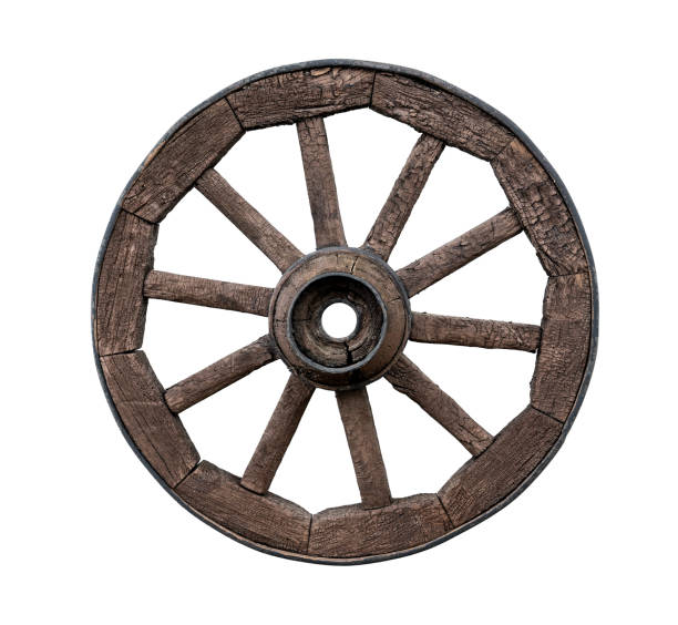 Wooden cartheel isolated on white background Old wooden wagon wheel isolated on white background horse cart photos stock pictures, royalty-free photos & images