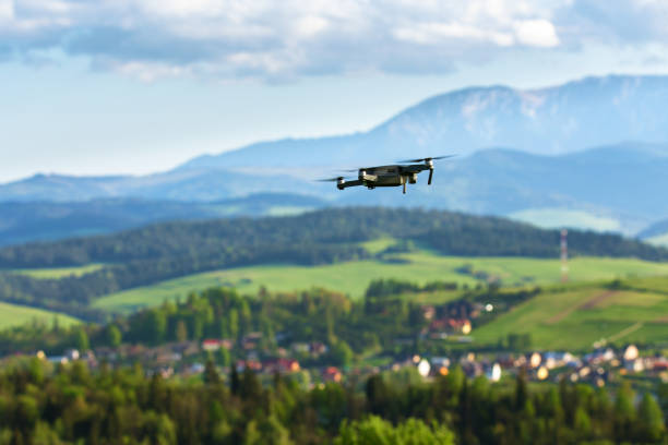istock Aerial photography and videography. Drone flying over mountain fields. 978232398
