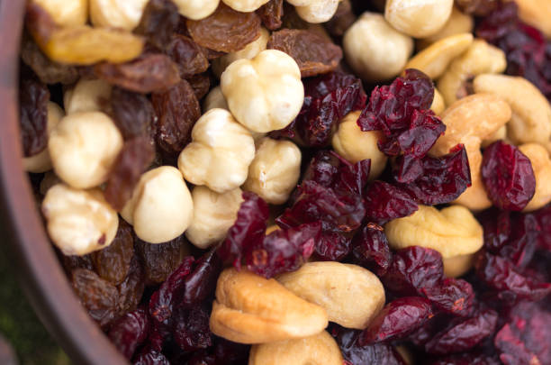 istock Dried hazelnuts, cashews, almonds and raisins. 978237474