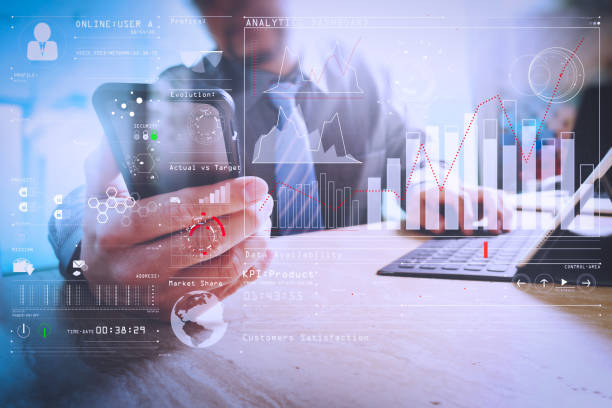 istock businessman using smart phone and keyboard dock digital tablet.Worldwide network connection technology interface.on marble desk,sun flare effect 978238424