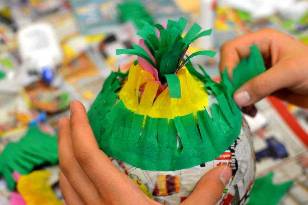 istock Children hands are making a pinata. 978245250