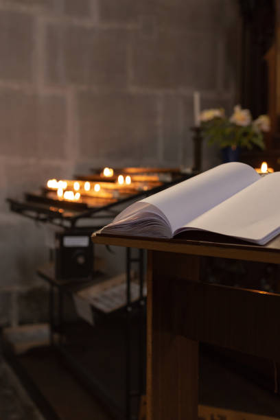 istock votive altar in church with emtpy guestbook 978249546