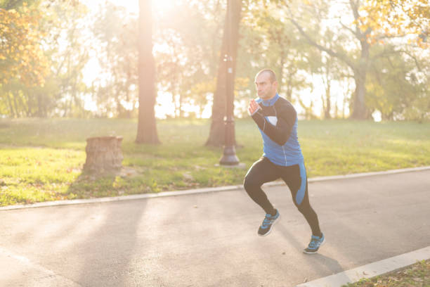 istock Sporty young man making sprints at the park 978250298