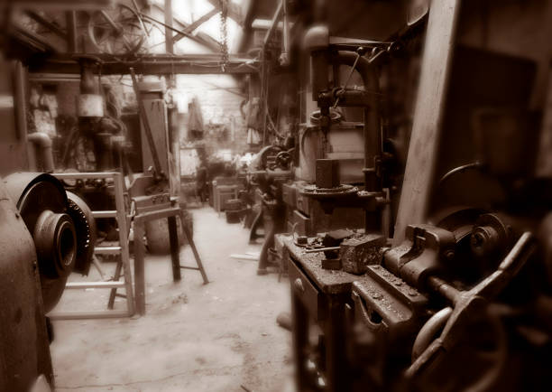 istock OLD MACHINERY IN DERELICT TEXTILE MILL 978254894