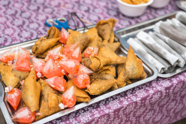 istock Samosa is snack fried filled puff with spicy sauce 978254910