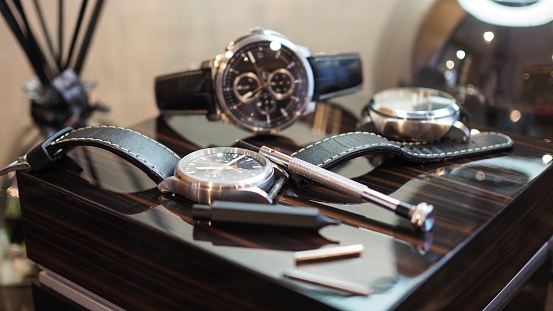 Watches and leather straps with tools.
