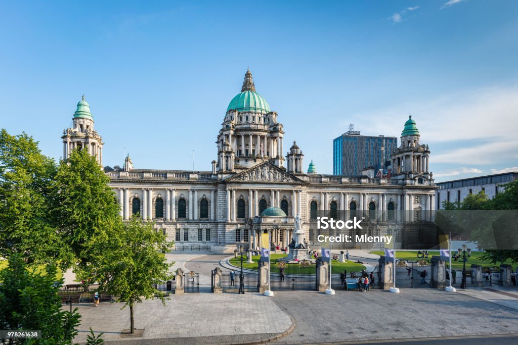 Belfast City Hall Northern Ireland, United Kingdom View from above towards the Belfast City Hall in summer under sunny blue sky. Edited with unrecognizable people, removed and retouched all logos and trademarks. Belfast, Northern Ireland, United Kingdom. Belfast Stock Photo