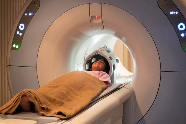 istock Asian girl on MRI scanner 978265118