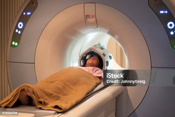 Asian Girl On Mri Scanner Stock Photo - Download Image Now - MRI Scan, MRI Scanner, Child